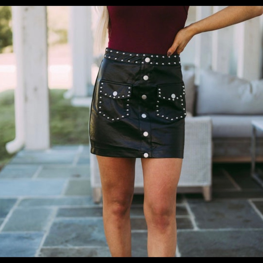 Studded faux leather mini skirt